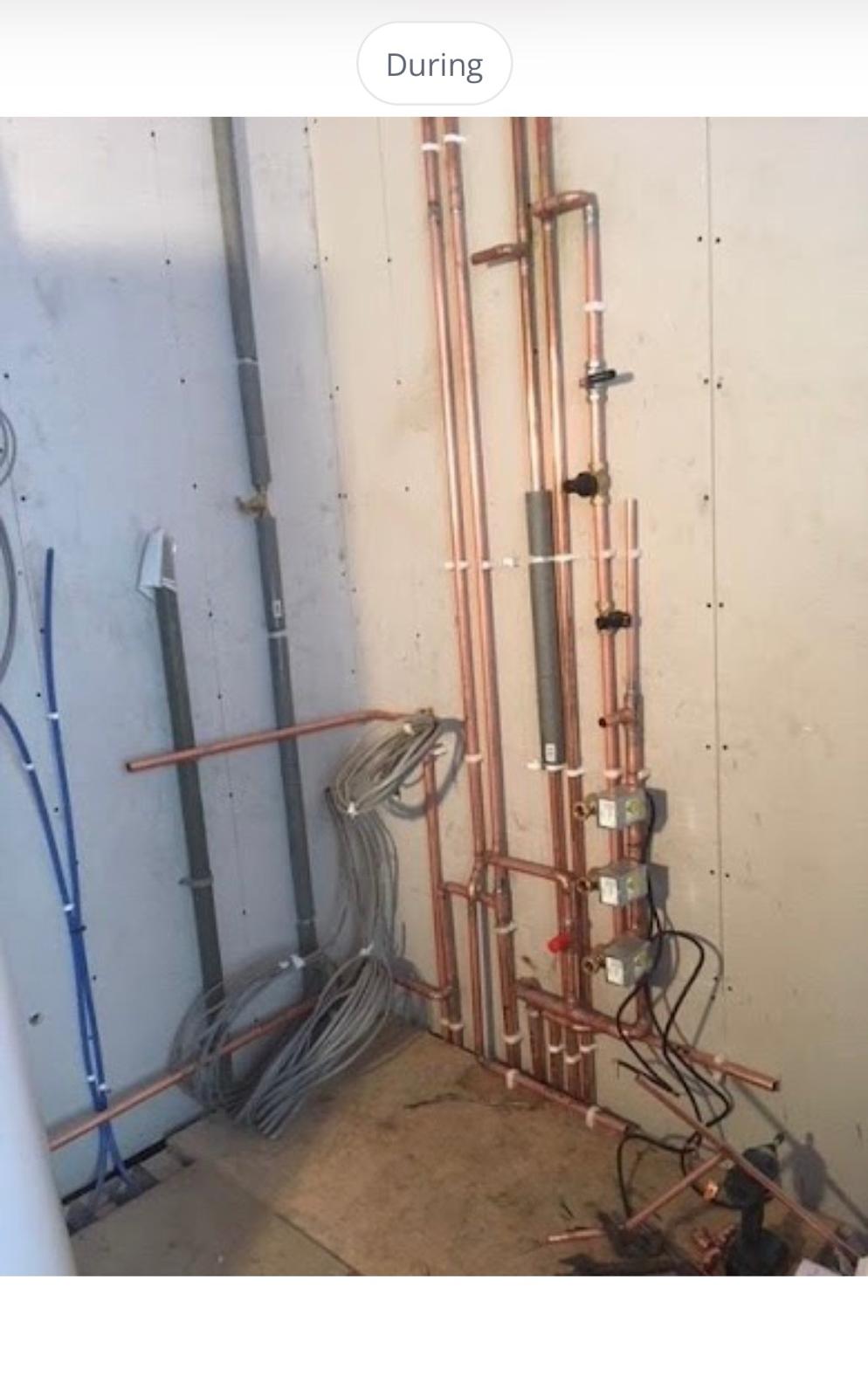 Before: cylinder and heating pipework installation